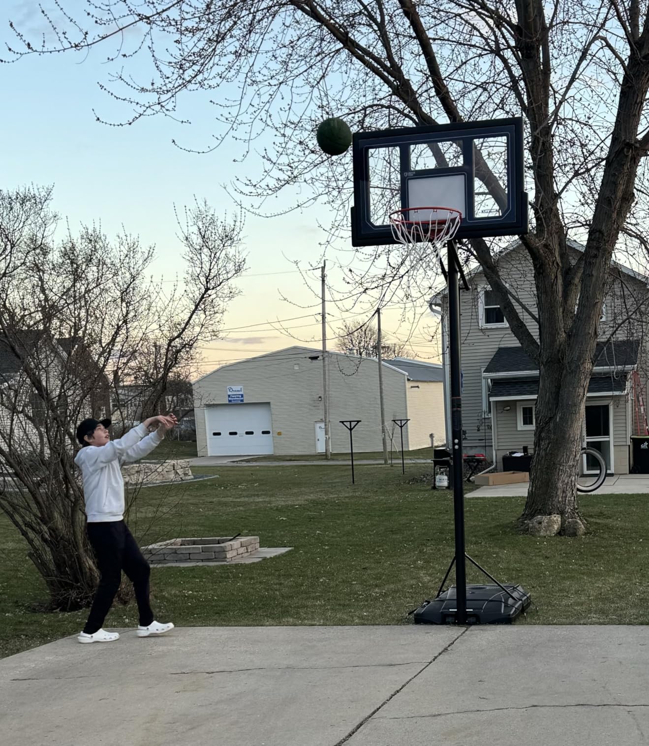 Lifetime 1529 Courtside Height Adjustable Portable Basketball System, 50 Inch Shatterproof Backboard, Black/Red/Blue customer photo 2