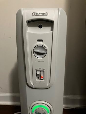 De'Longhi Oil filled Radiator Heater, 1500W Electric Space Heater for indoor use, portable room heater, Energy Saving, full room like office and bedroom with safety features, EW7707CM customer photo 2