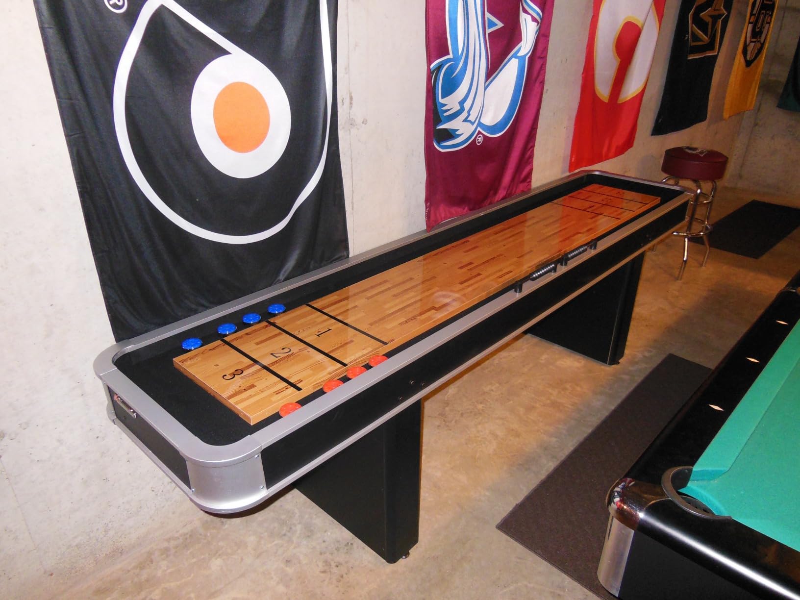 Atomic 9’ LED Shuffleboard Tables with Poly-Coated Playing Surface for Smooth, Fast Puck Action and Pedestal Legs with Levelers for Optimum Stability and Level Play customer photo 2