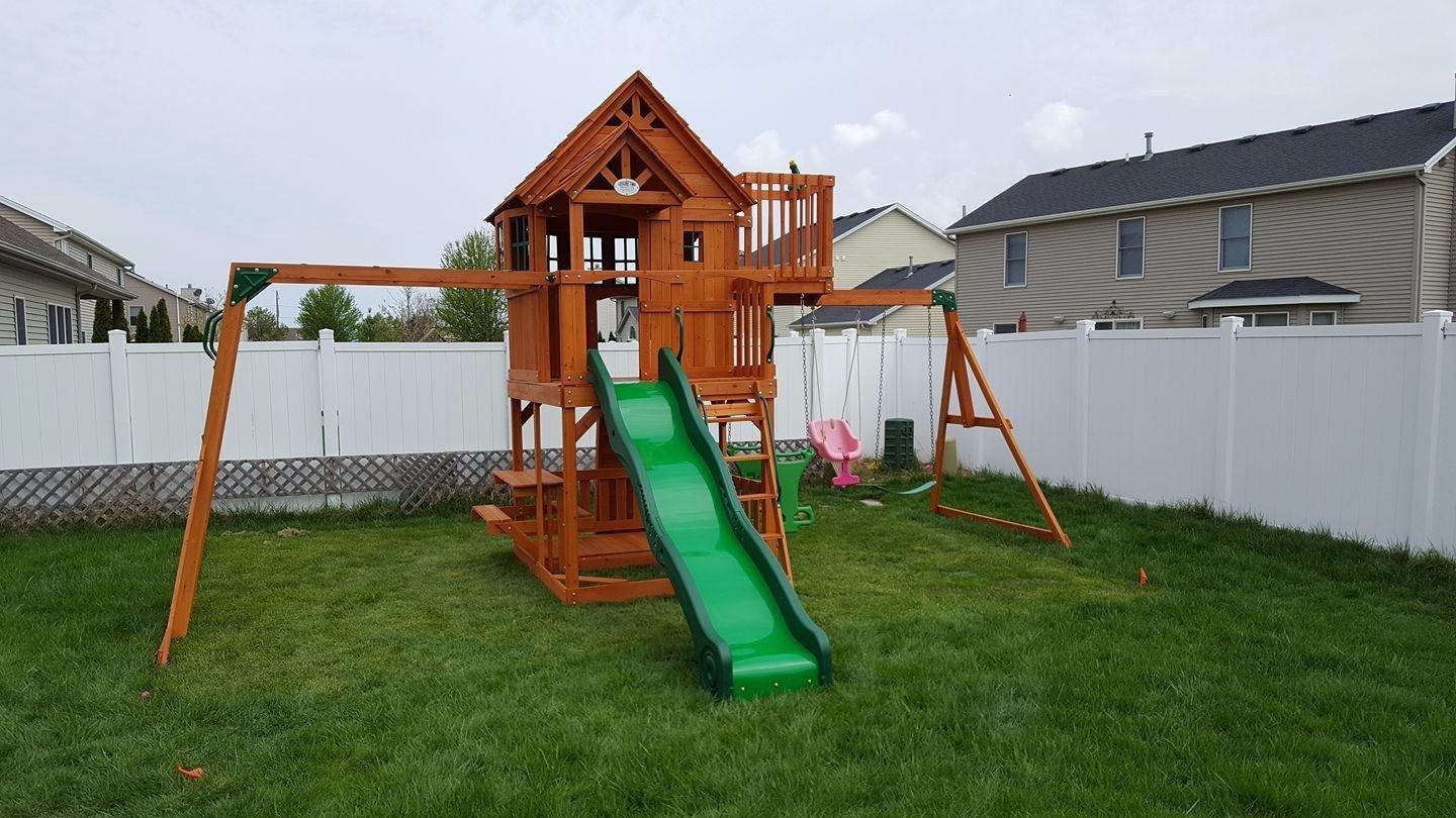 Backyard Discovery Skyfort II Cedar Wood Swing Set with Wave Slide, Raised Clubhouse, Crow's Nest, Monkey Bars, Balcony, Belt Swings, Trapeze, Rock Wall, Picnic Table, Sandbox, Ladder, Outdoor Playset customer photo 1