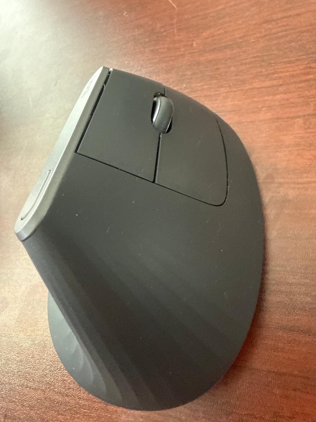Logitech MX Vertical Wireless Mouse - Ergonomic Design Reduces Muscle Strain, Move Content Between 3 Windows and Apple Computers, Rechargeable, Graphite customer photo 1