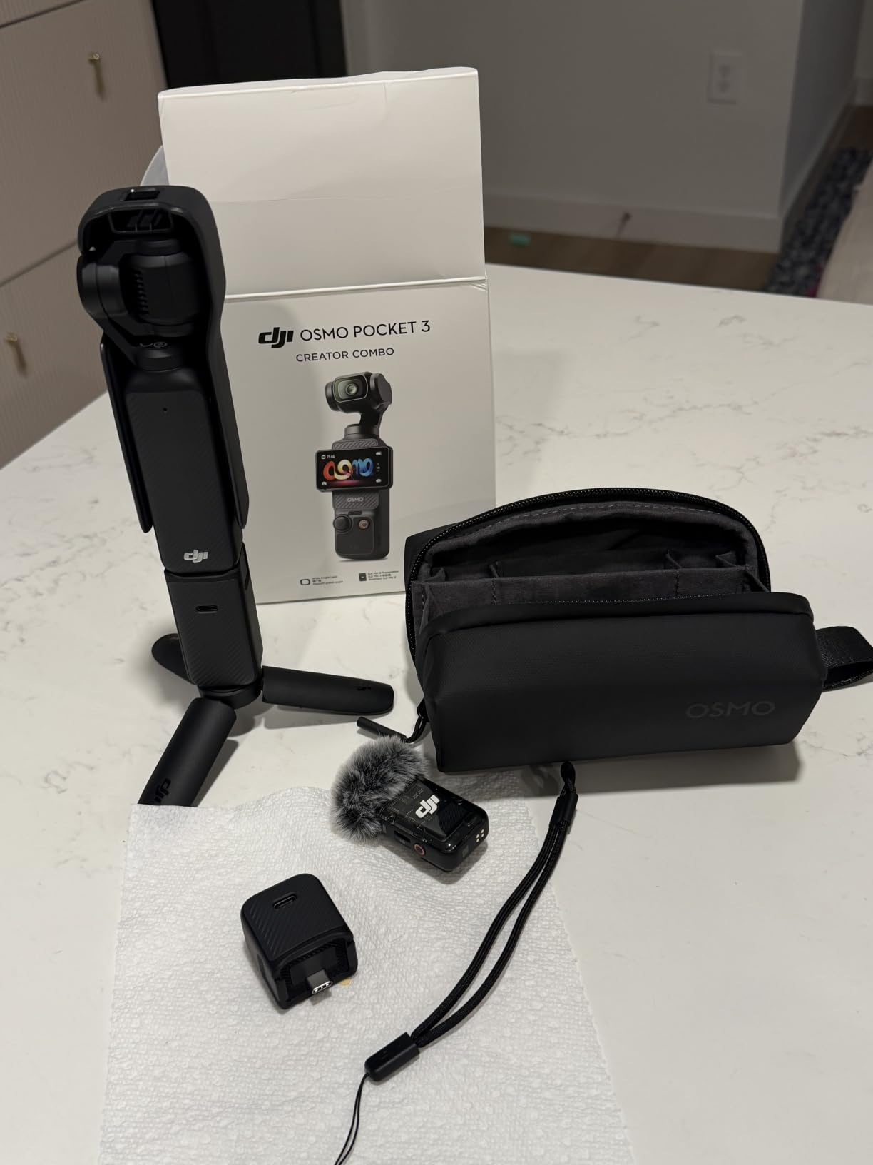 DJI Osmo Pocket 3 Creator Combo, Vlogging Camera with 1'' CMOS & 4K/120fps | 3-Axis Stabilization, Spotlight Follow, Fast Focusing, Mic Included for Clear Sound customer photo 1