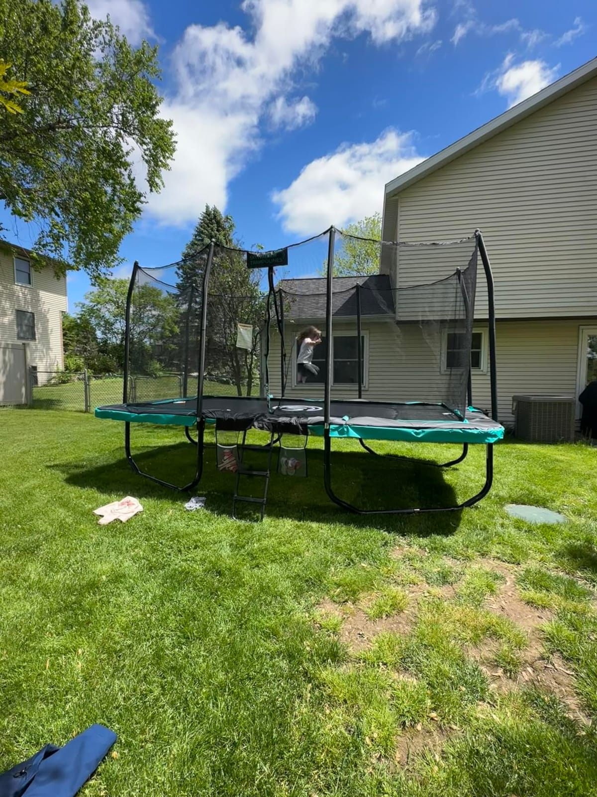 SKYWALKER TRAMPOLINES 12 FT 15 FT Round Trampoline with Safety Enclosure Net, 9 x 15 FT Rectangle Outdoor Trampoline, Recreational Trampoline for Kids customer photo 2