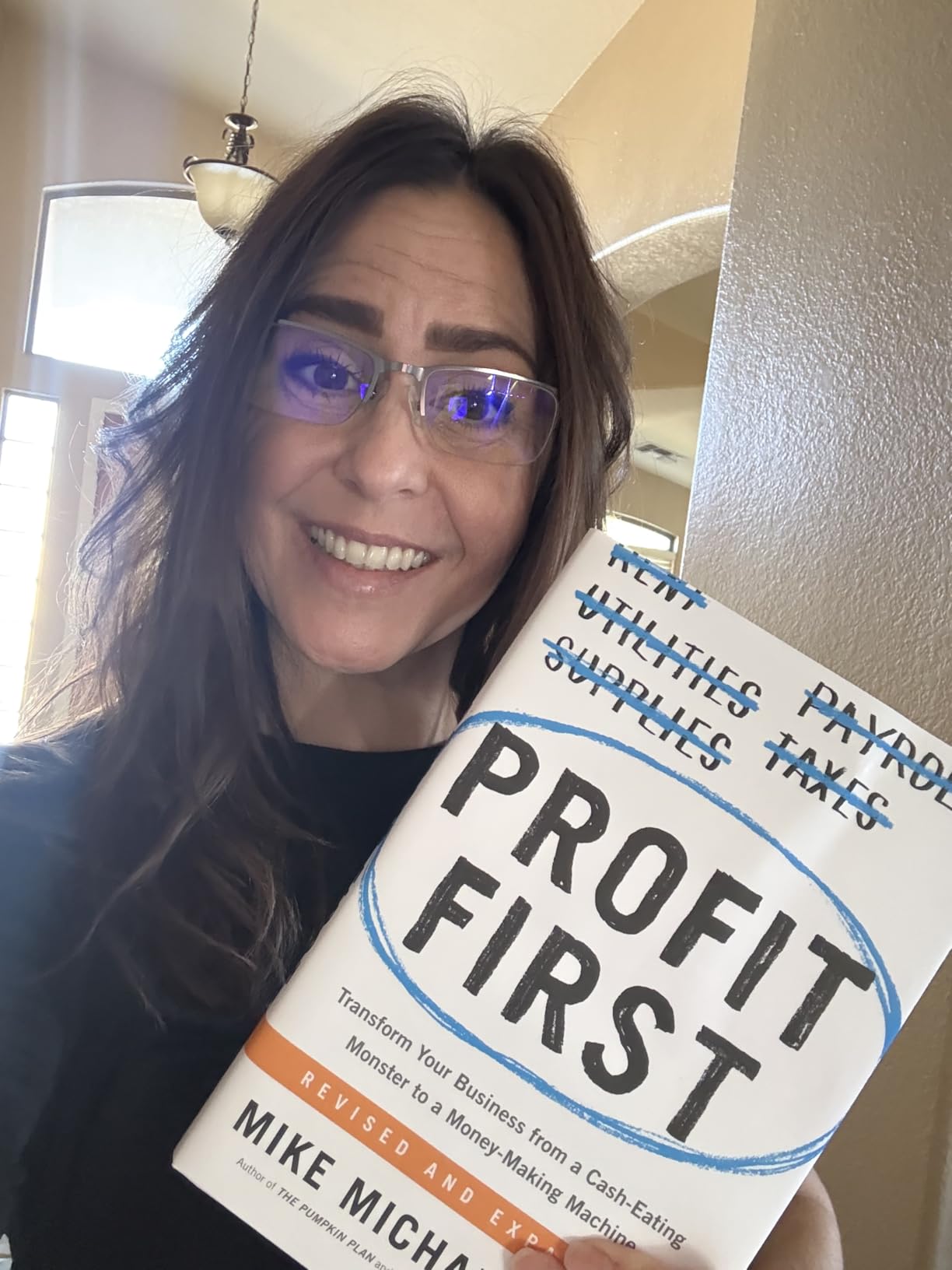 Profit First: Transform Your Business from a Cash-Eating Monster to a Money-Making Machine (Entrepreneurship Simplified) customer photo 1