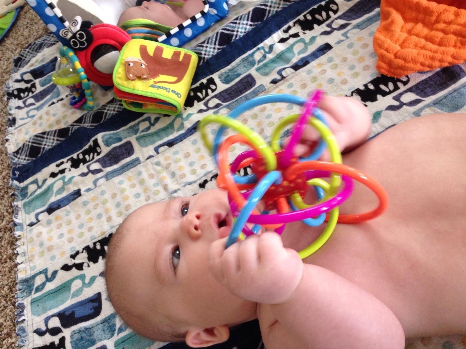 Manhattan Toy Winkel Rattle & Sensory Teether Toy, Blue/Green/Orange, 5 Inch x 4 Inch x 3.5 Inch customer photo 2