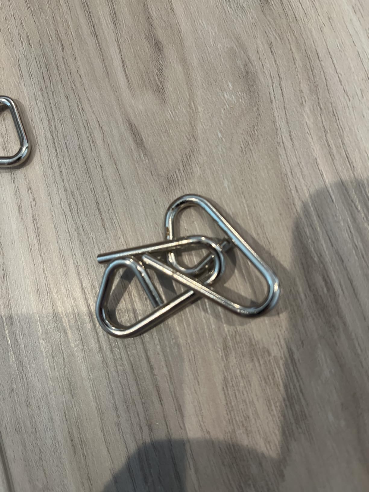 Coogam Metal Wire Puzzle Set of 16 with Pouch,Brain Teaser IQ Test Disentanglemen Iron Link Unlock Interlock Game Chinese Ring Magic Trick Toy for Party Favor Kids Adults Challenge customer photo 2