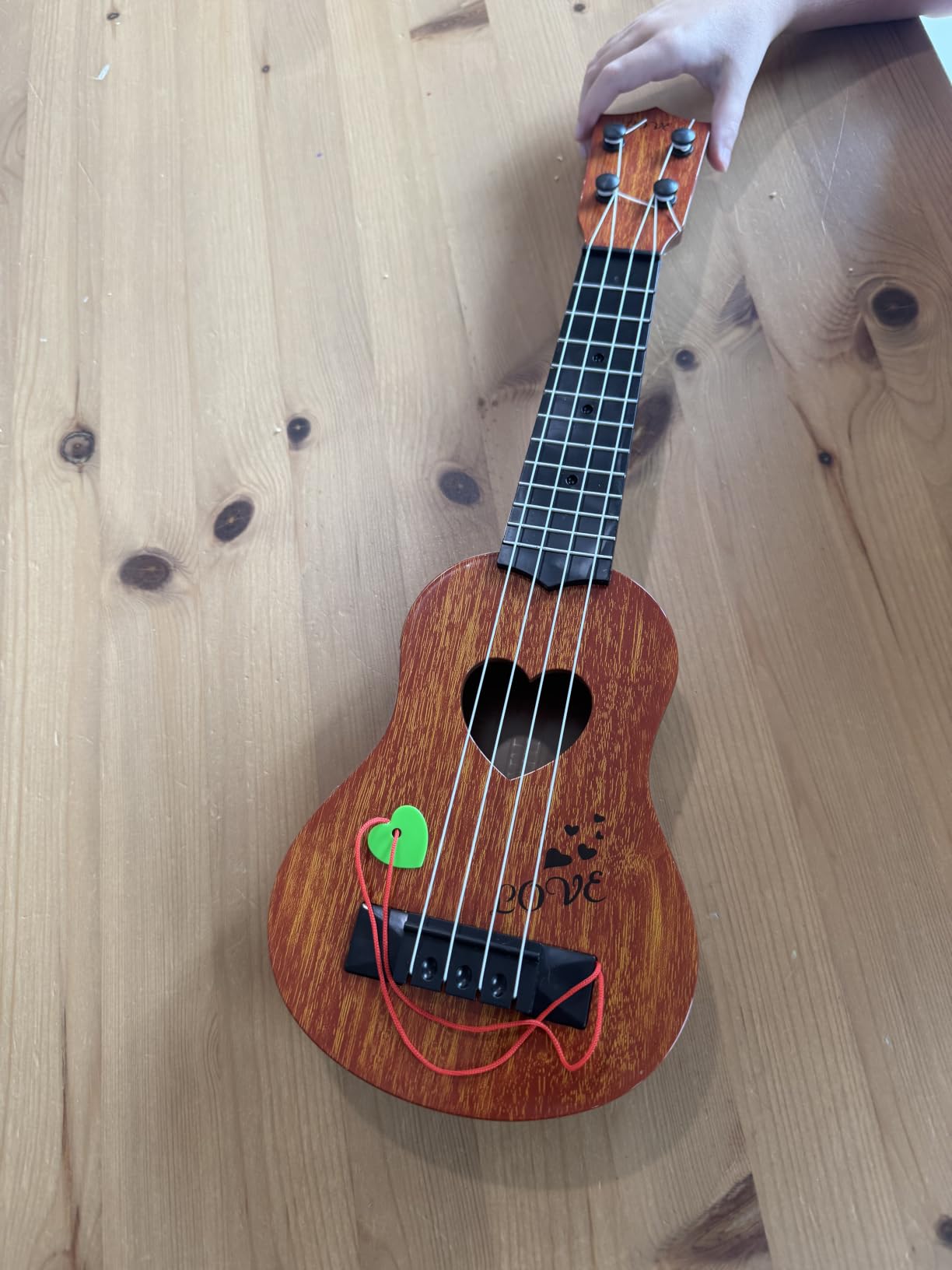YEZI Kids Toy Classical Ukulele Guitar Musical Instrument for Kids customer photo 1