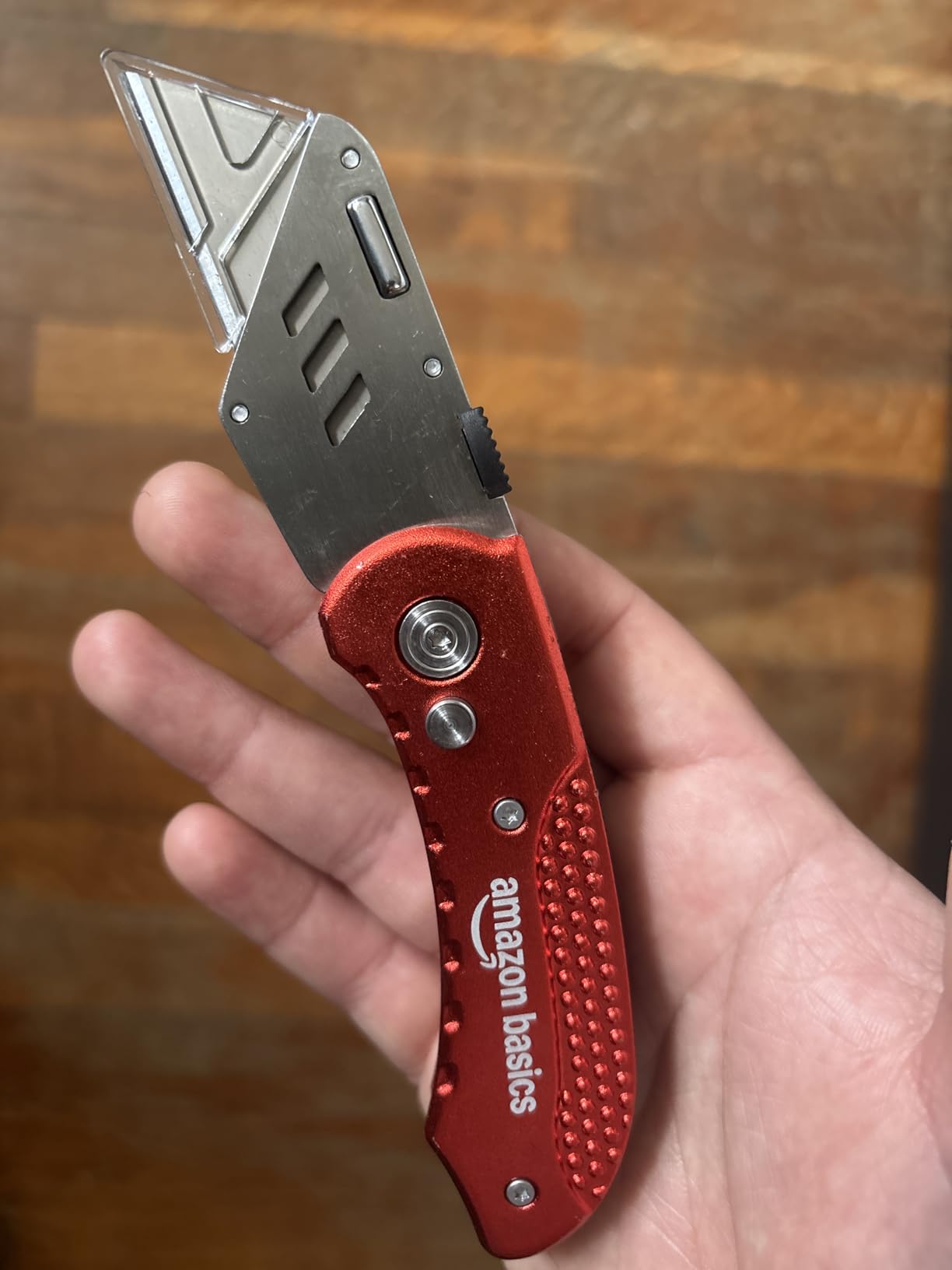 Amazon Basics Folding Utility Knife Box Cutter with Back-lock Mechanism, Portable Lightweight Aluminum Handle, Red customer photo 1