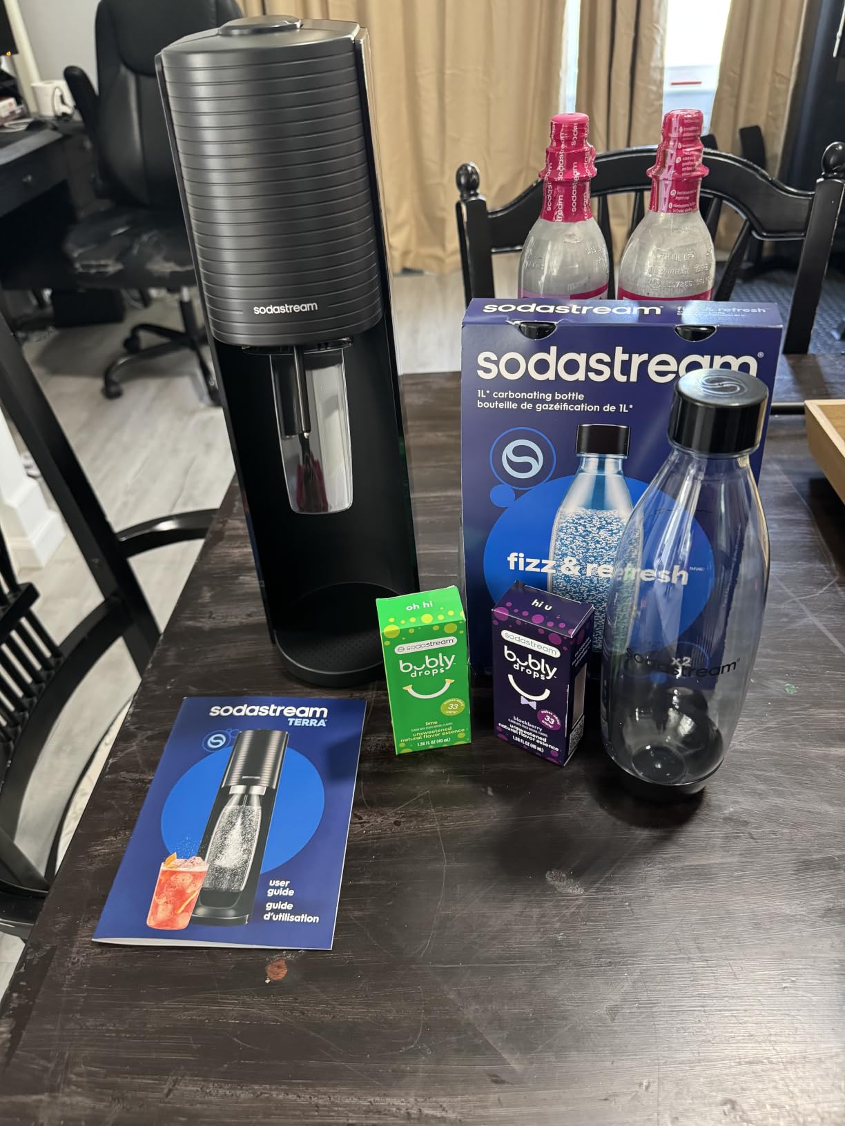 SodaStream TERRA Sparkling Water Maker, Value Bundle, CQC CO2 System, Includes 2 Quick Connect 60L CO2 Cylinders, 3 Dishwasher Safe BPA Free Bottles, 2 bubly Flavor Drops, Make your own Pepsi, Black customer photo 1