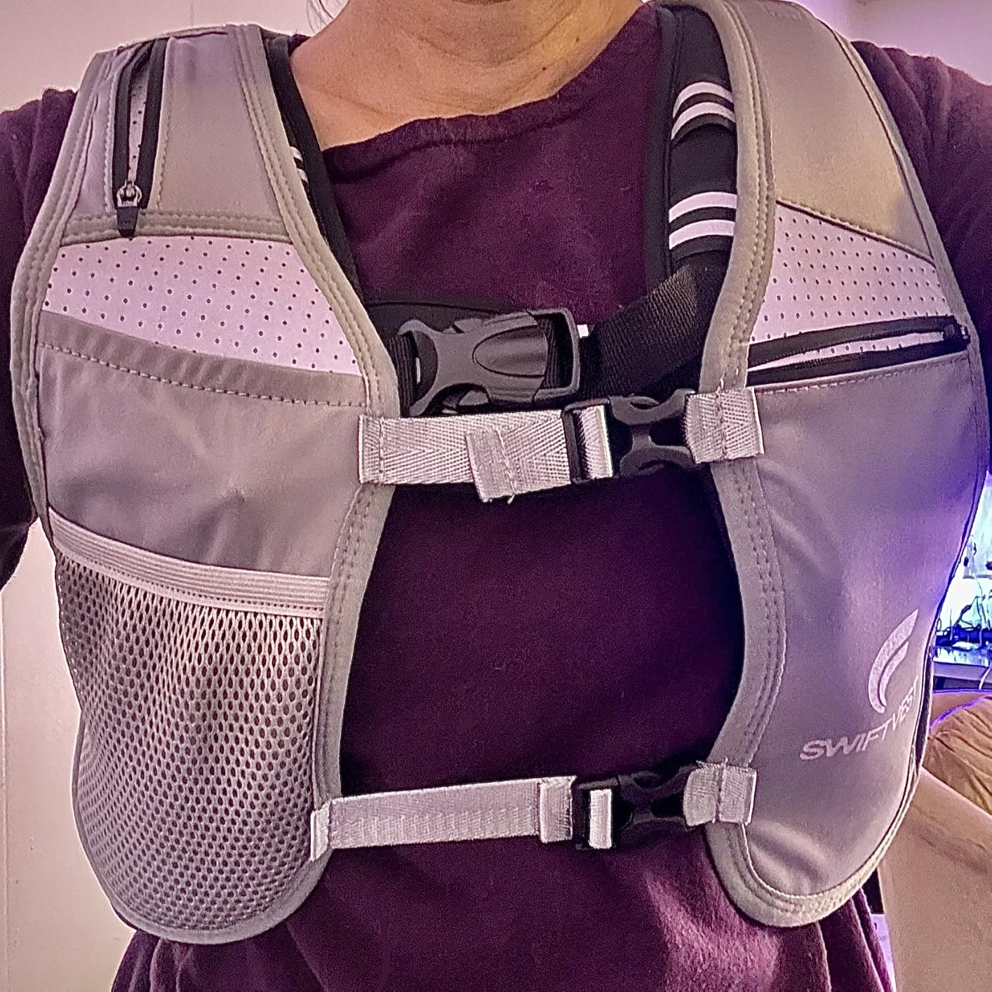 Running Phone Holder Vest with 500ml/17oz Water Bottle | Reflective Hydration Vest | Adjustable | Light | 6 Pockets for Running Accessories | Unisex customer photo 2
