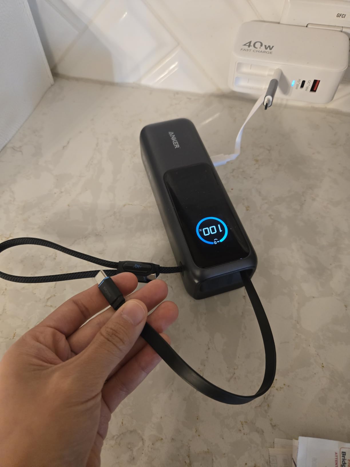 Anker Laptop Power Bank, 25,000mAh Travel Essential with 165W Total Output | 3 USB-C Ports with 100W Max Each, Built-In Retractable Cables, Flight-Ready, for iPhone 17 Series, MacBook, and More customer photo 2