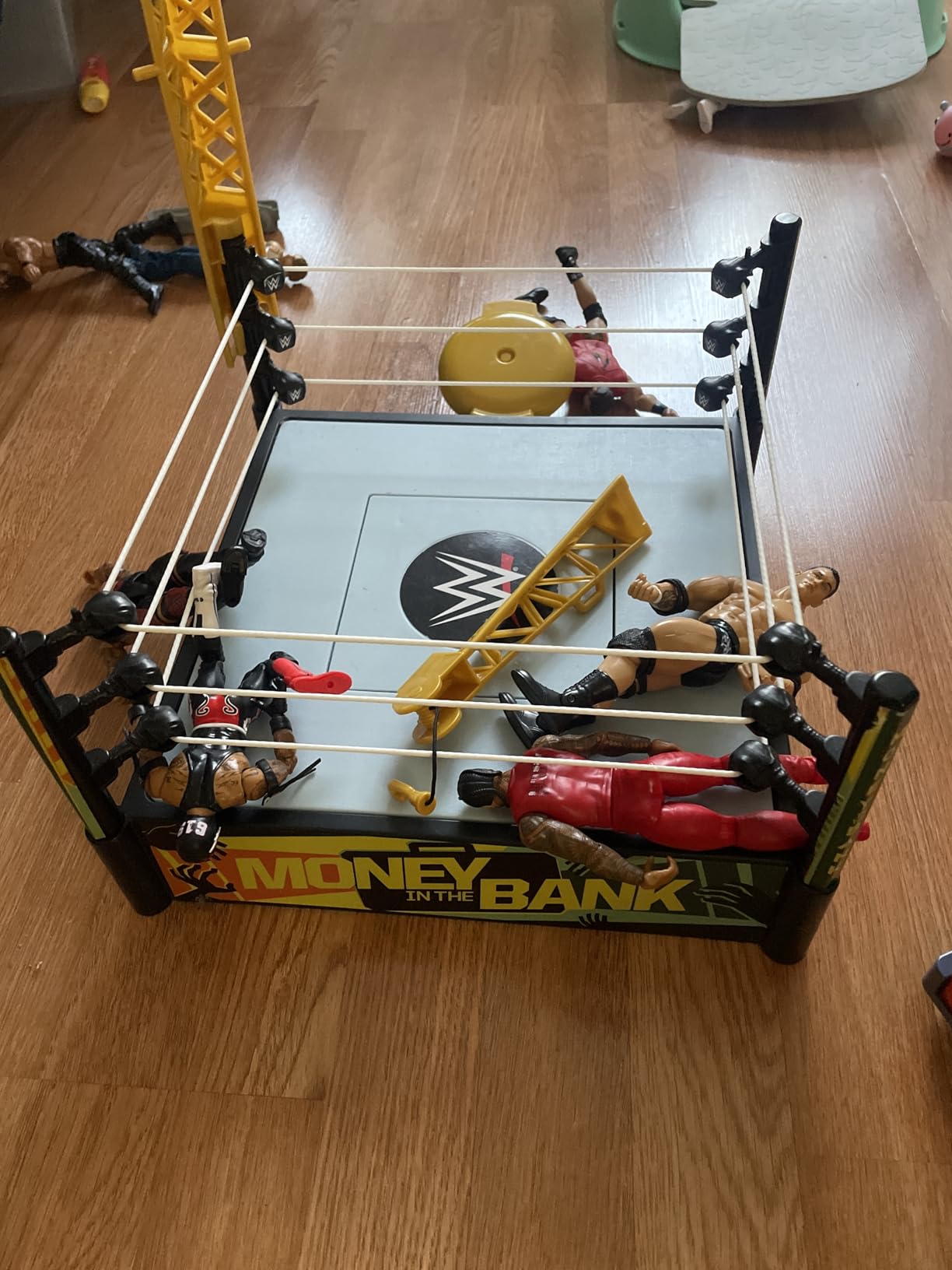 Mattel WWE Money in The Bank Cash-in Ring Playset with 2 Play Modes & 40+ Sounds & Phrases, Includes Launcher Crane, Ladders & Briefcase, 13-Inch x 20-Inch customer photo 1