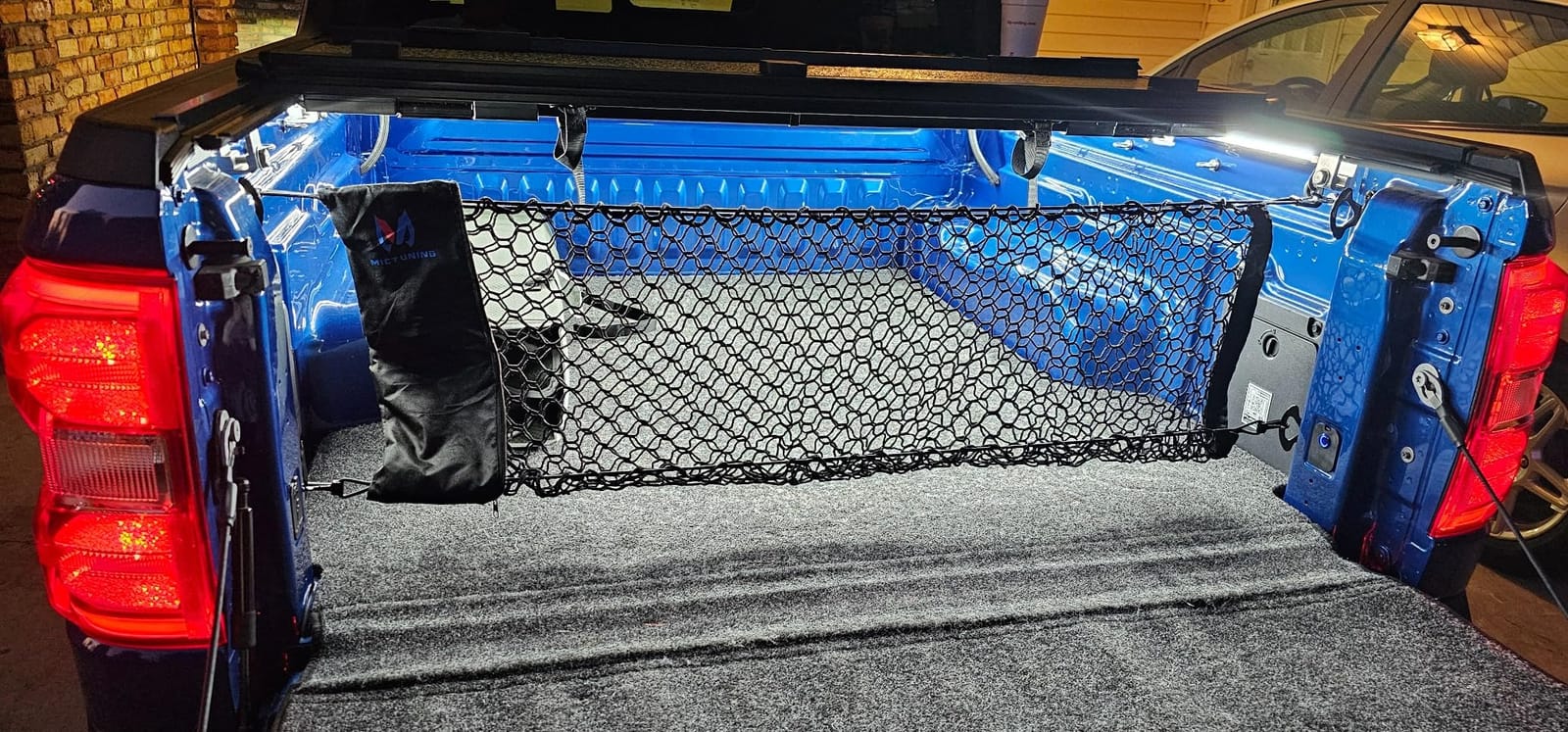 MICTUNING Upgraded 41 x 30 Inch Cargo Net Auto Trunk Rear Cargo Organizer Elastic Mesh Net Holder - Universal Fit for SUV Truck Mini Vans customer photo 2